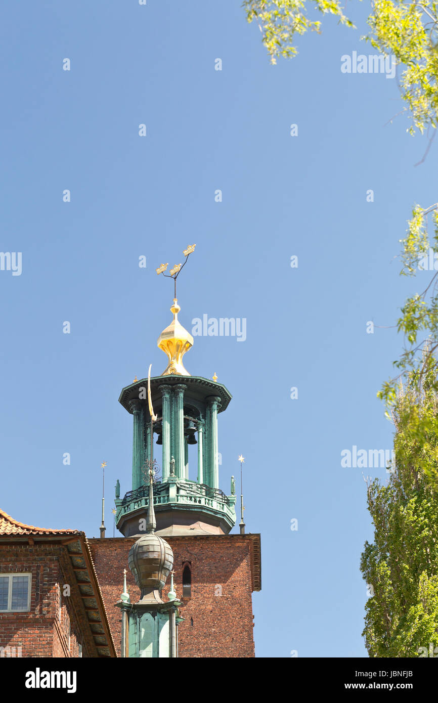 Stockholm, Sweden - Three crowns at the tower of the Stadshuset (City Hall), Kungsholmen Stock Photo