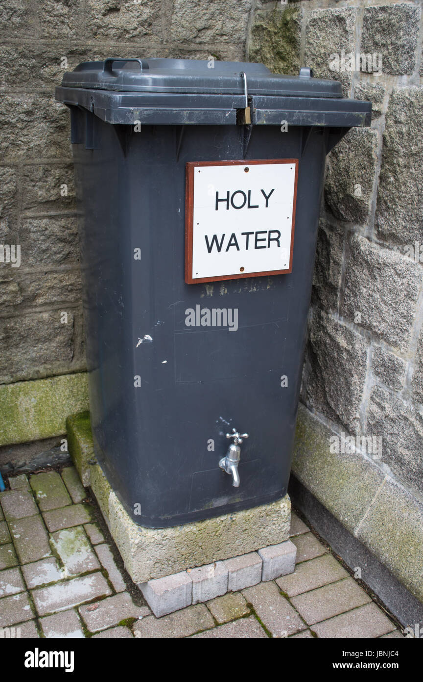 Holy water in a wheelie bin Stock Photo Alamy