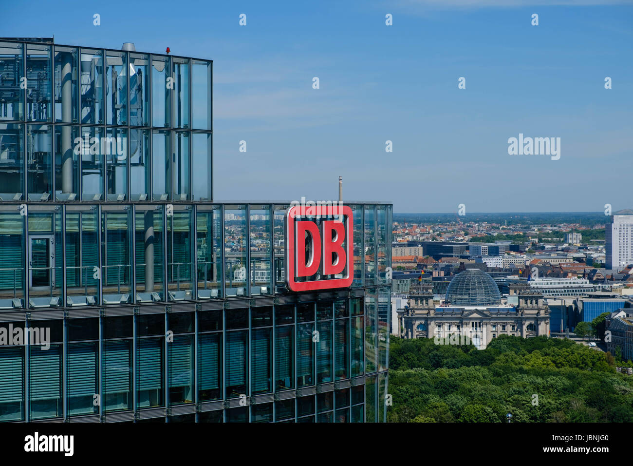 Berlin, Germany - june 9, 2017: The logo of the Deutsche Bahn AG ( German Railroad Company) on top of the Headquarter office building in Berlin, Germa Stock Photo