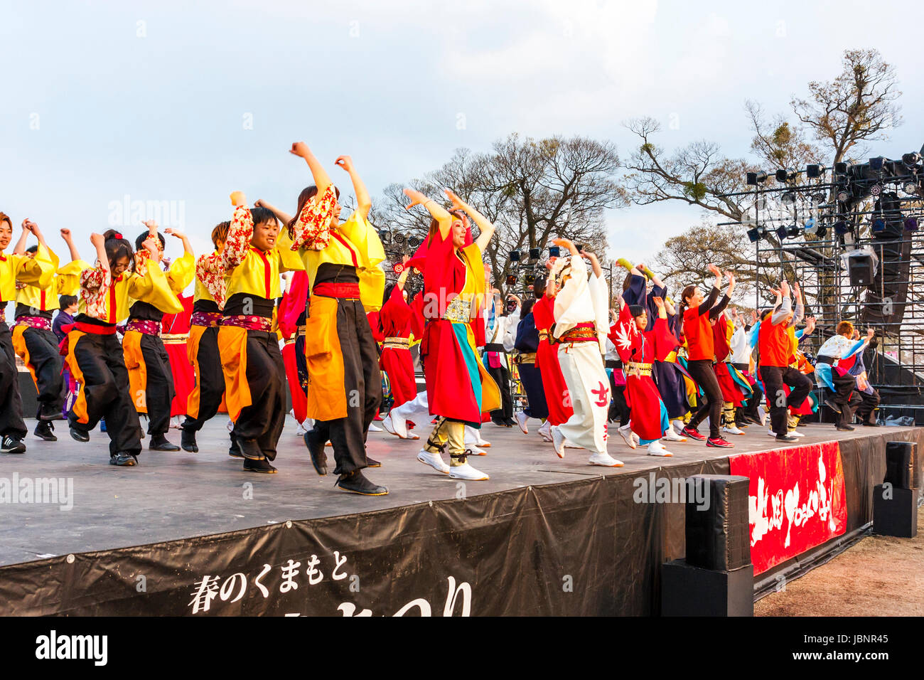 Hinokuni Yosakoi Dance Festival at Kumamoto, Japan. Members of various dance teams dancing together on stage for the grand finale of the two day event. Stock Photo