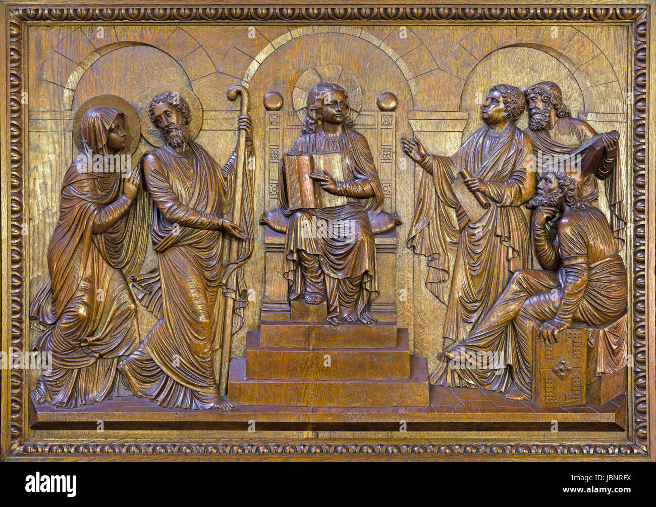 BERLIN, GERMANY, FEBRUARY - 15, 2017: The carved relief  Twelve old Jesus in the Temple in St. John the Baptist basilica (Johannes Basilika) by Anton  Stock Photo