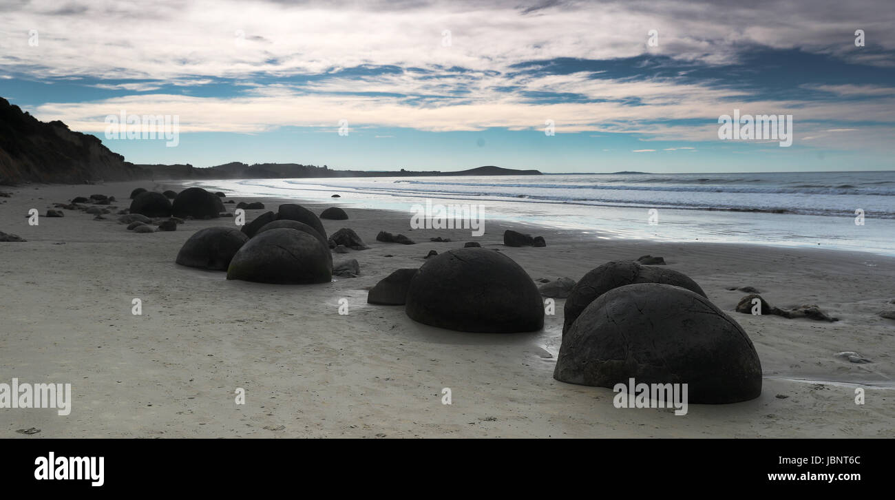 Moeraki Boulders on Koekohe Beach near Moeraki on New Zealand'€™s Otago coast. Stock Photo