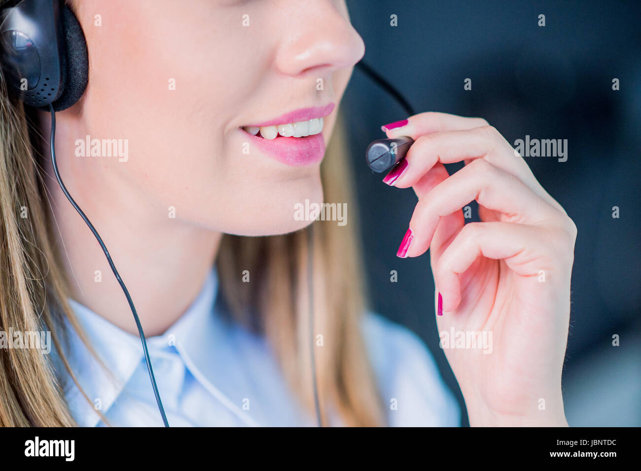 Woman customer service worker call center operator with phone headset, Beautiful young call-center assistant smiling , isolated Stock Photo