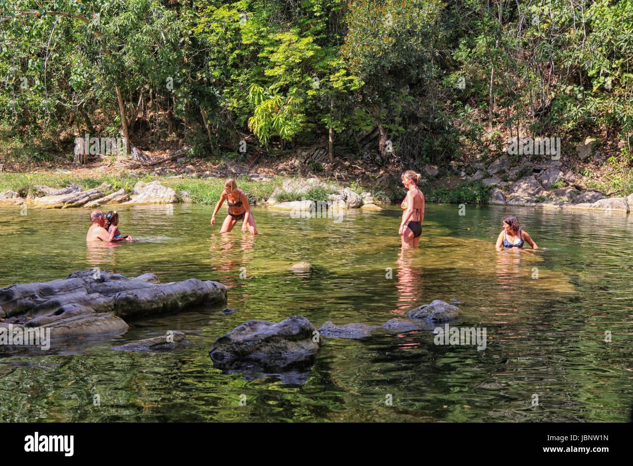 LAS TERRAZAS, CUBA-FEBR 27: People enjoying the cooling water of the Baños de San Juan, Las Terrazas, Artemisa province, Cuba, Stock Photo