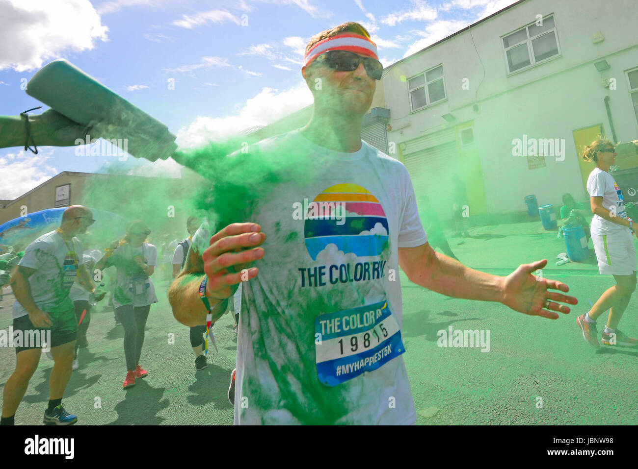 https://c8.alamy.com/comp/JBNW98/color-run-london-at-wembley-park-sprayed-showered-with-coloured-powder-JBNW98.jpg
