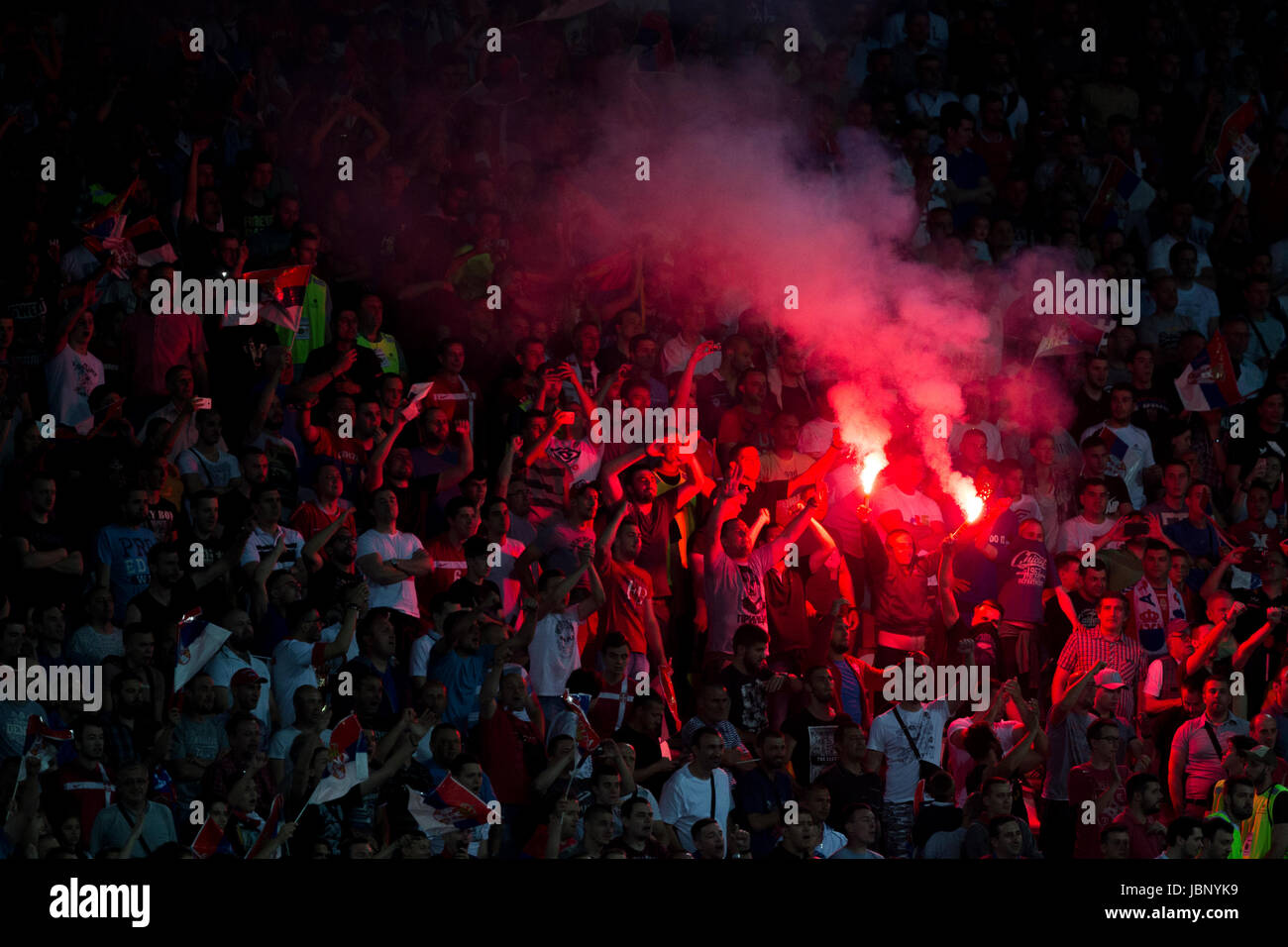 BELGRADE, SERBIA - JUNE 11, 2017: Serbian fans celebretin first goal of Serbia during the 2018 FIFA World Cup Qualifier match between Serbia and Wales Stock Photo