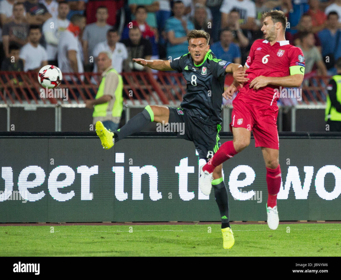 BELGRADE, SERBIA - JUNE 11, 2017: Branislav Ivanovic (R) of Serbia in action against Emyr Huws (L) of Wales during the 2018 FIFA World Cup Qualifier m Stock Photo
