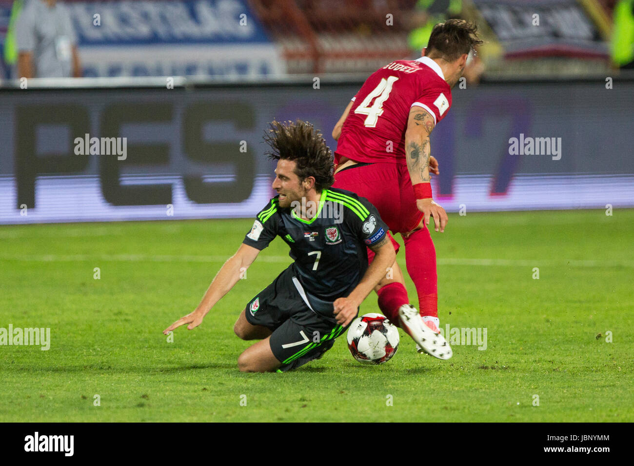 BELGRADE, SERBIA - JUNE 11, 2017: Joe Allen (L) of Wales fights for the ball with Nemanja Gudelj (R) of Serbia during the 2018 FIFA World Cup Qualifie Stock Photo