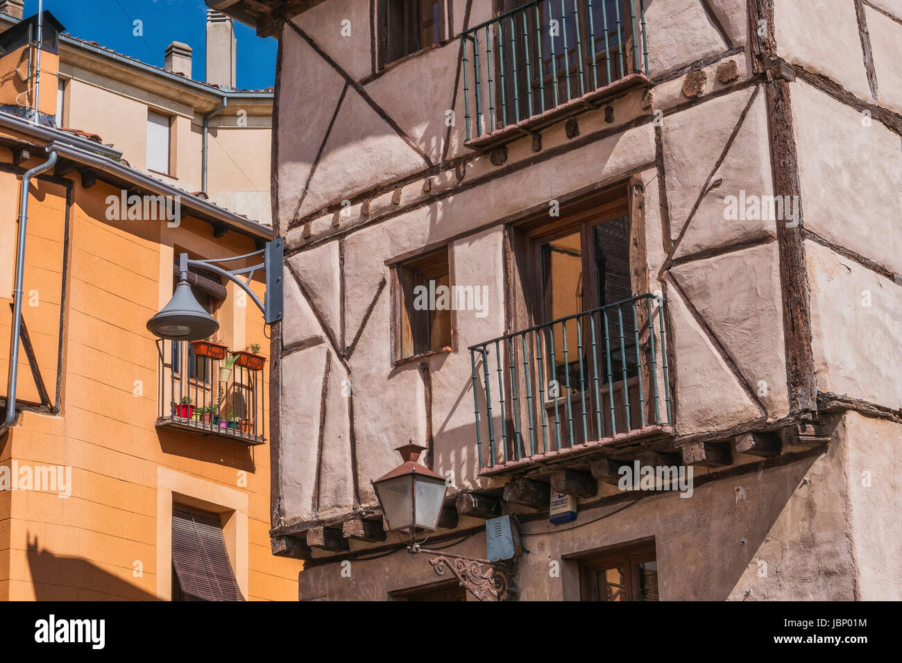 Old street of the quarter of the Jewry houses front constructed with seen brick located in the city of Segovia, Unesco World Heritage Site, Spain Stock Photo