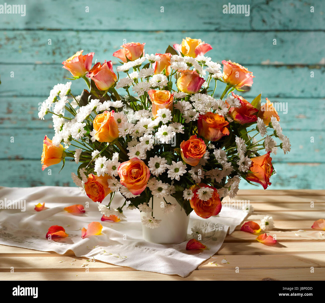 Bouquet of flowers with roses, margaritas. Stock Photo