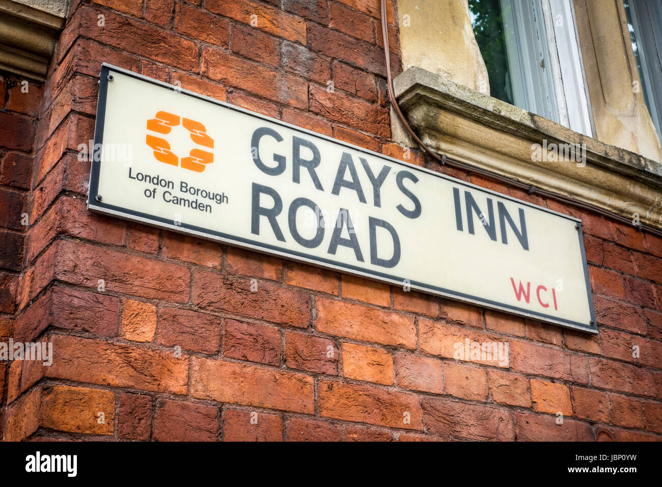 Grays Inn Road street sign on the side of a brick building, London