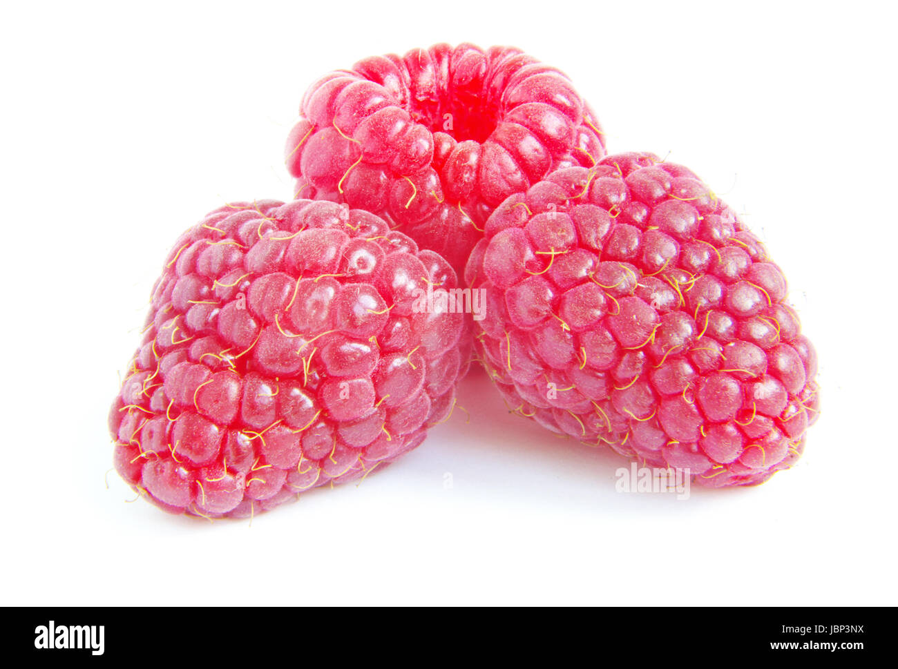 Ripe raspberry on a white background Stock Photo - Alamy