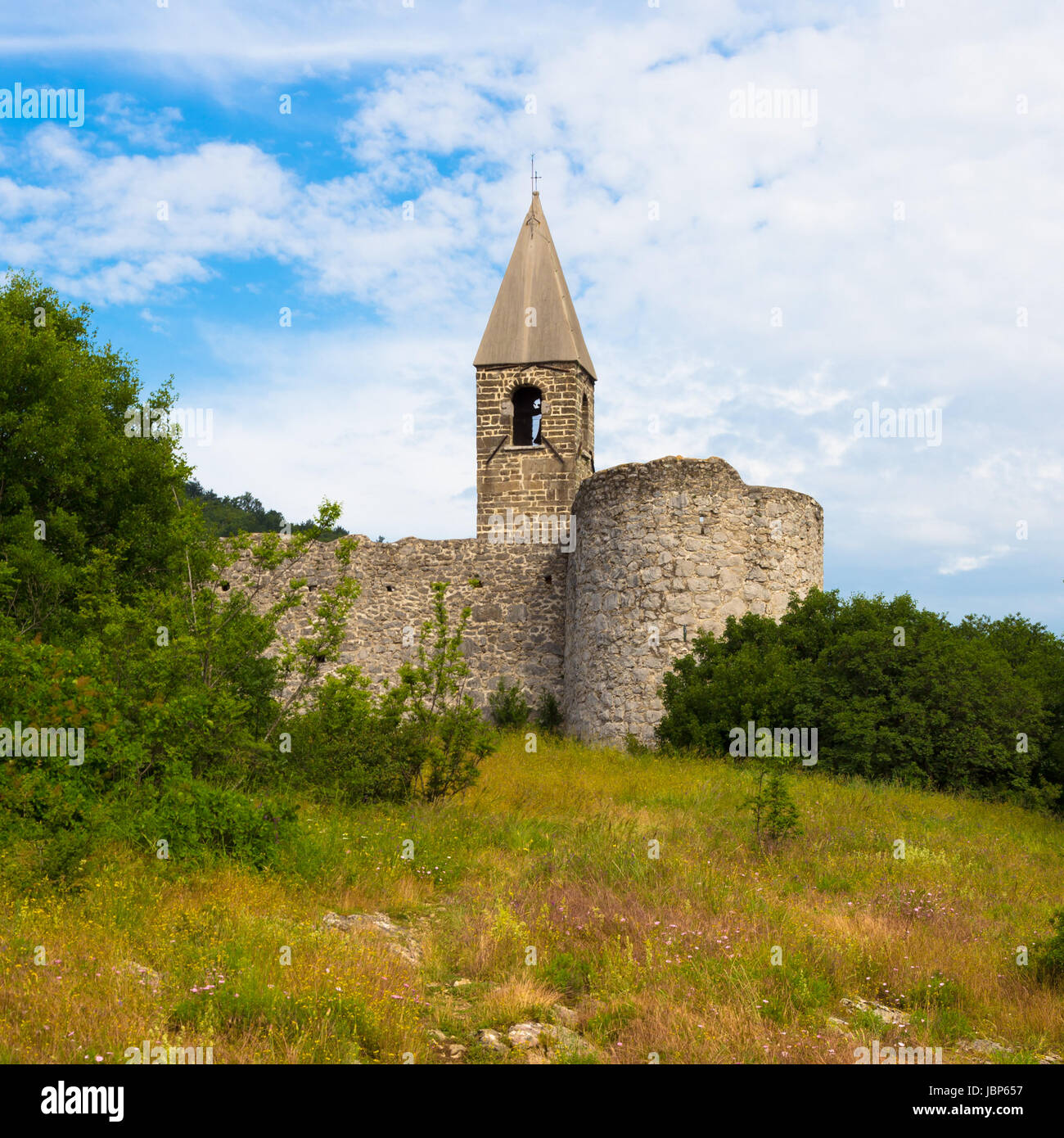 Church of the Holy Trinity, which contains famos late-medieval Danse Macabre fresco. Slovenia, Europe. Stock Photo