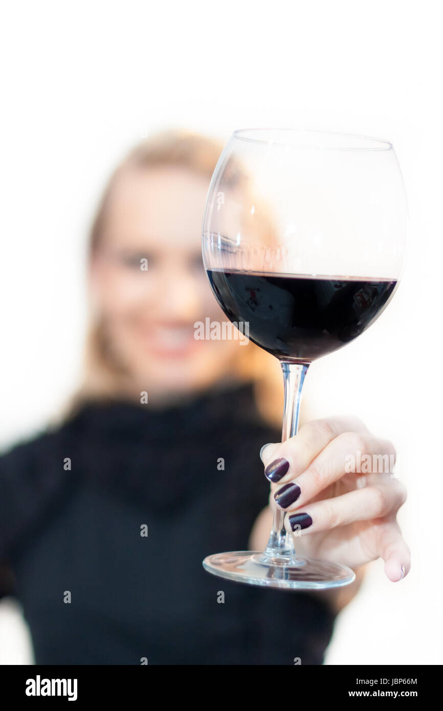 Business woman toasting with a glass of red wine Stock Photo - Alamy