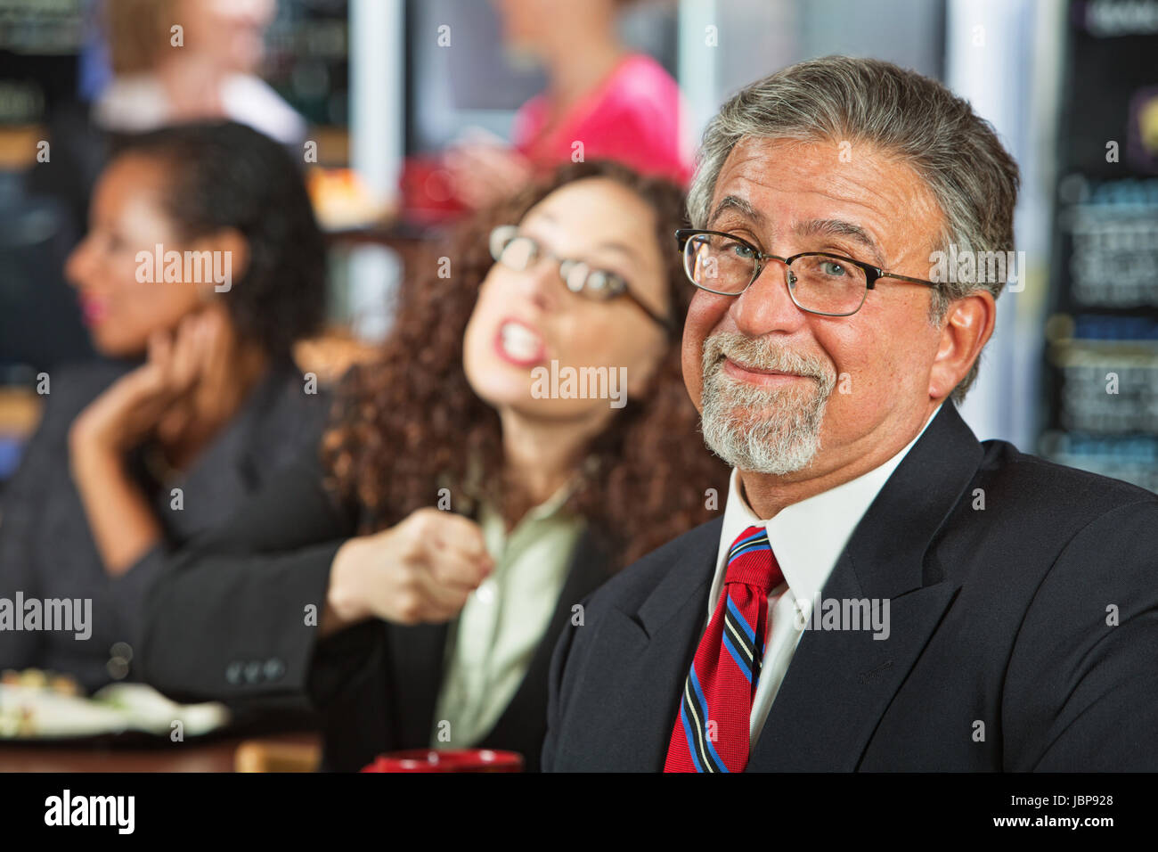 Two arguing business people in coffee house Stock Photo