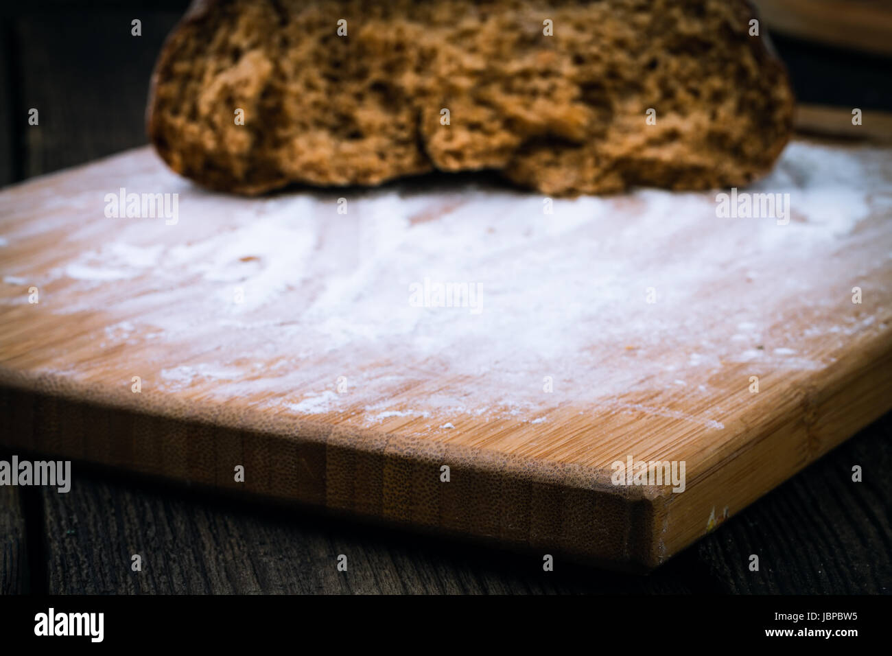 fresh white bread on wooden background Stock Photo - Alamy