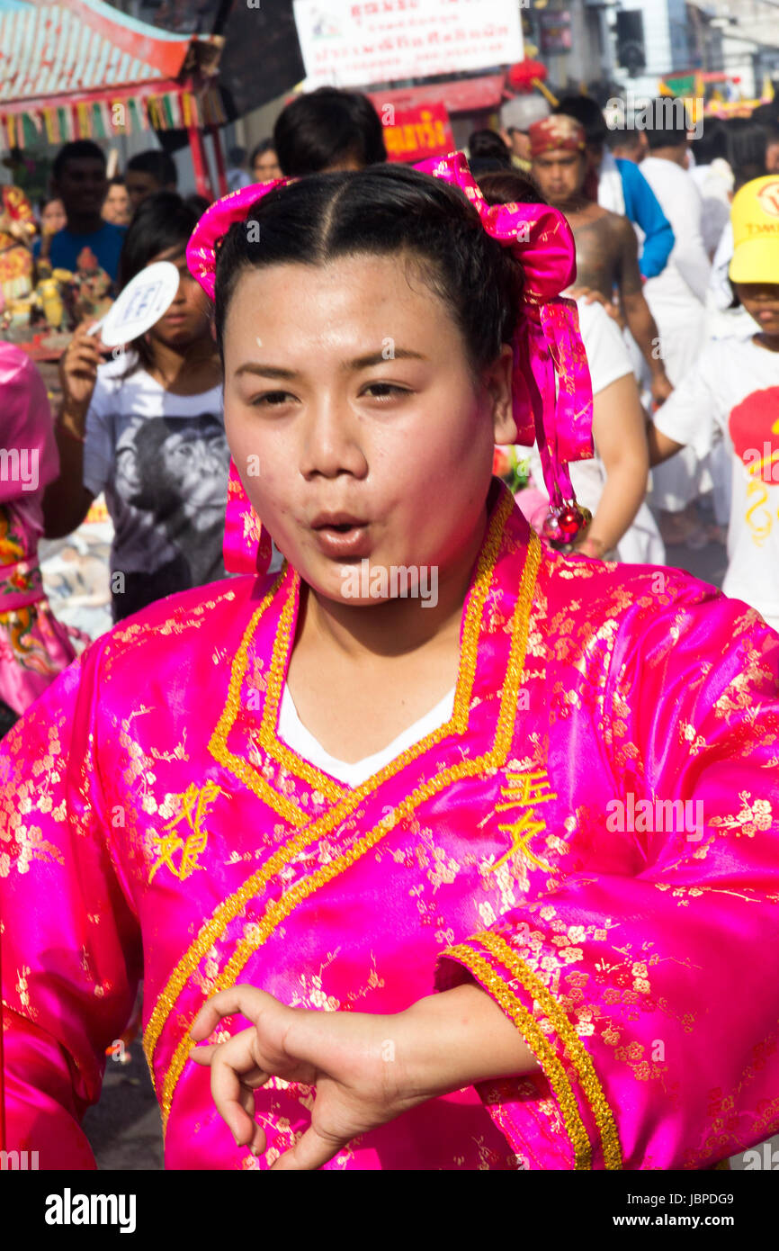Woman spirit medium in a parade during the Nine Emperor Gods festival ...