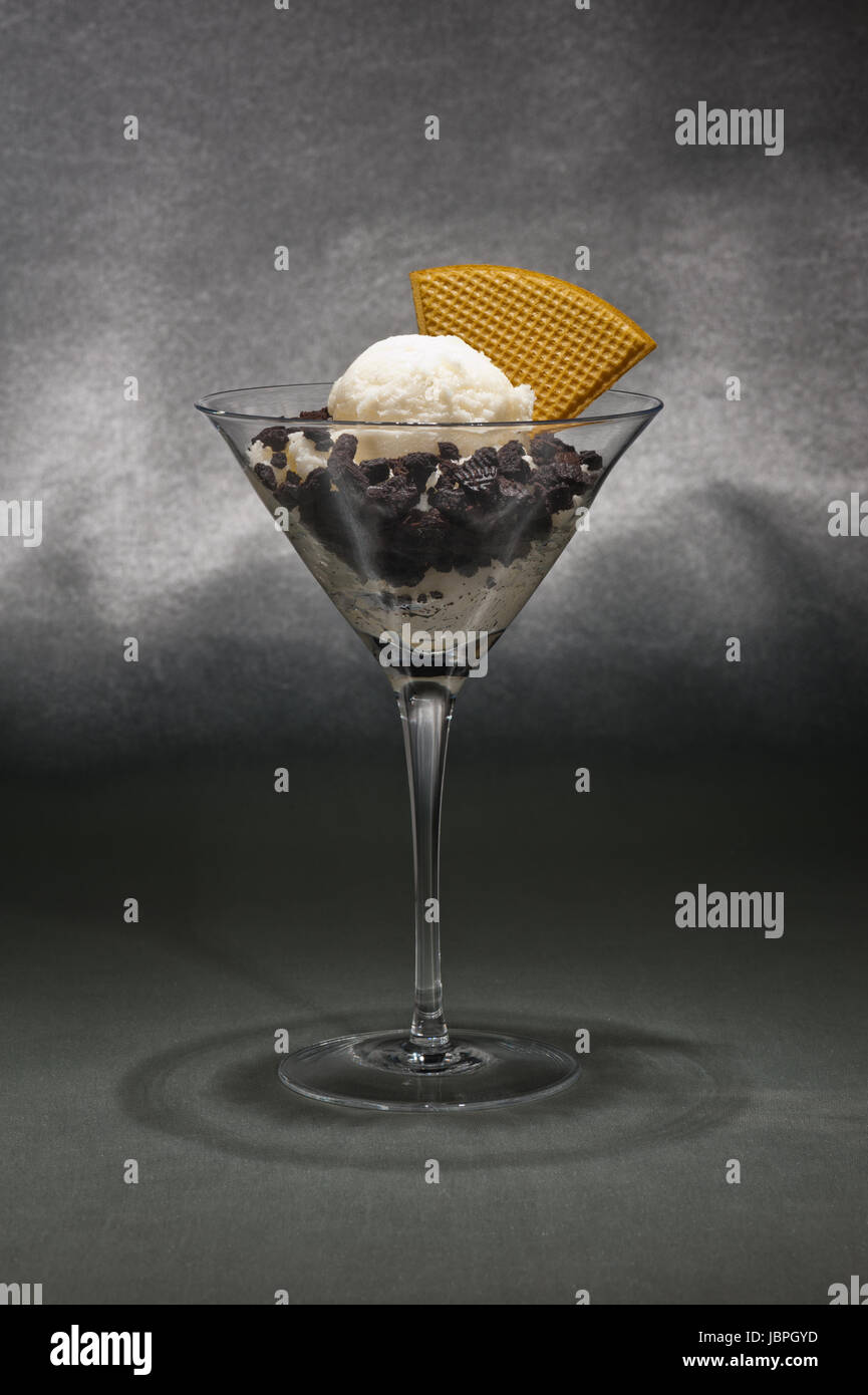 Cookies and ice cream in a Martini glass with with waffle decoration Stock Photo