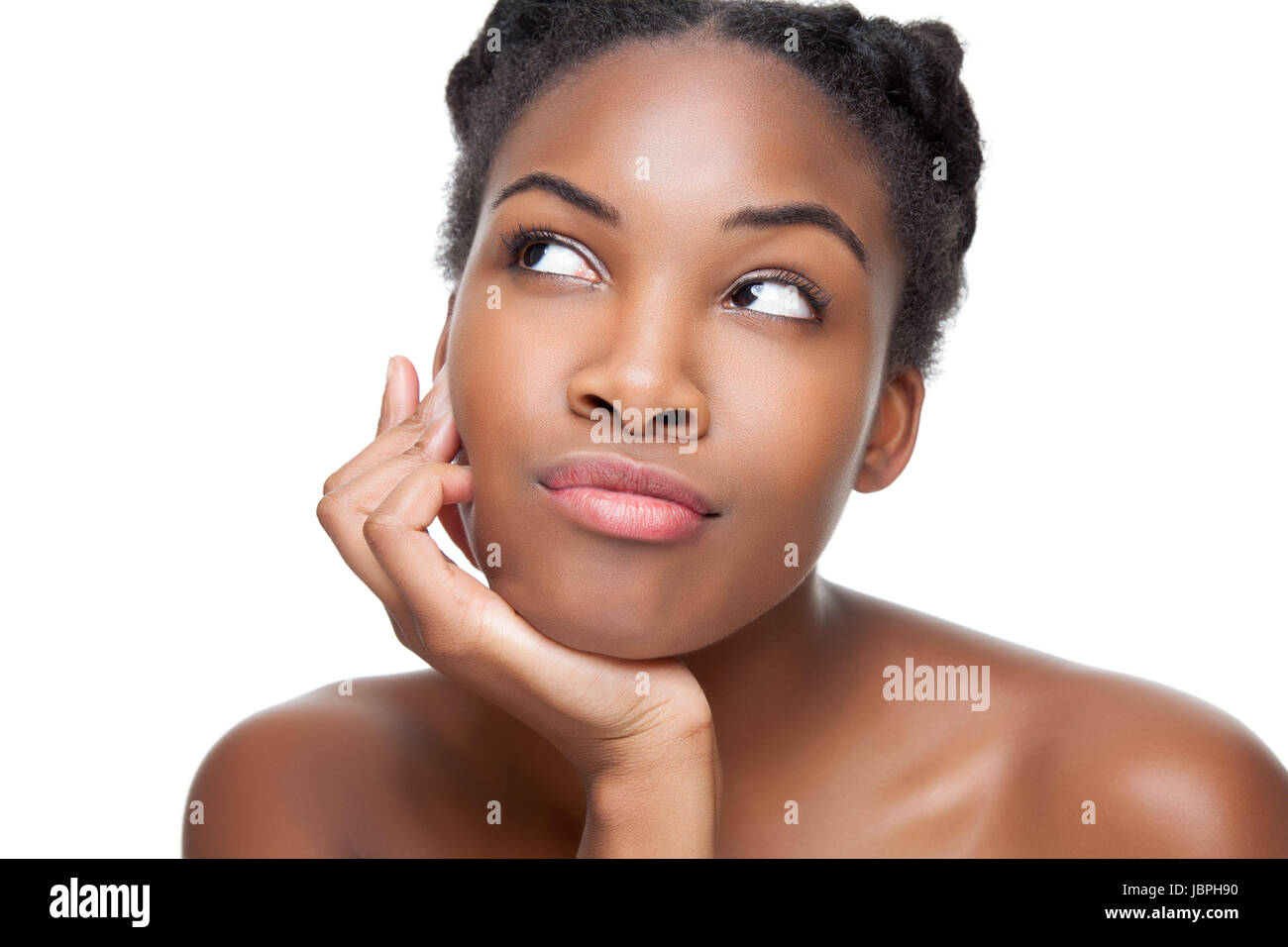 Beautiful young black woman looking up Stock Photo - Alamy