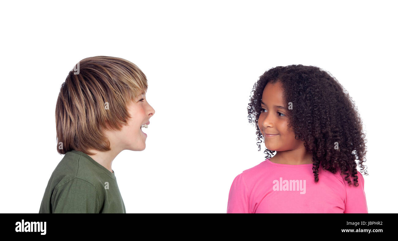 Boy talking with his friend, a beautiful african girl, isolated on a white background Stock Photo