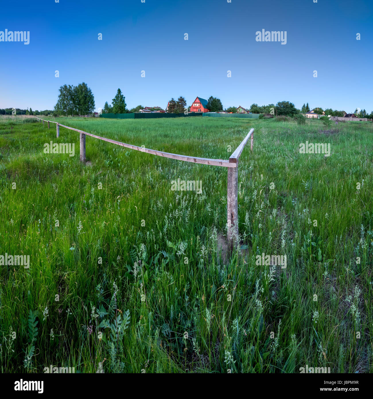 Red House and Wooden Fence in Traditional Russian Village near Moscow ...