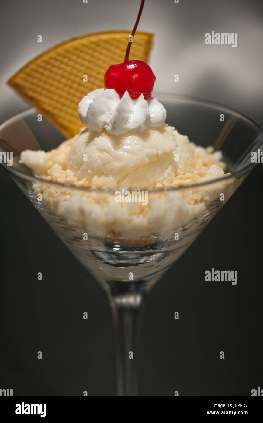 Schwarzwaelder Kirsch ice cream in a Martini glass  with with waffle decoration Stock Photo