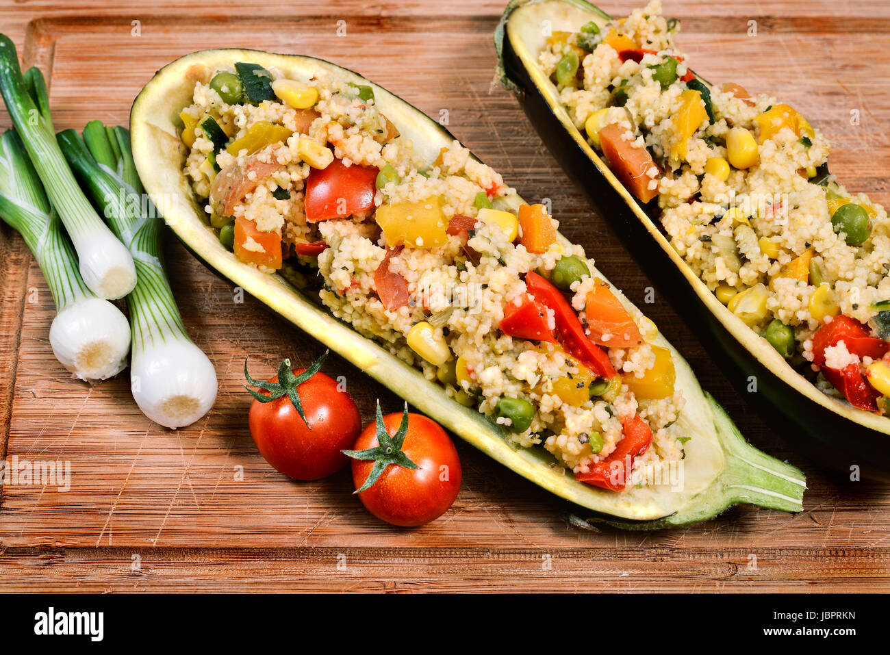 couscous with vegetables inside a hollowed eggplant Stock Photo