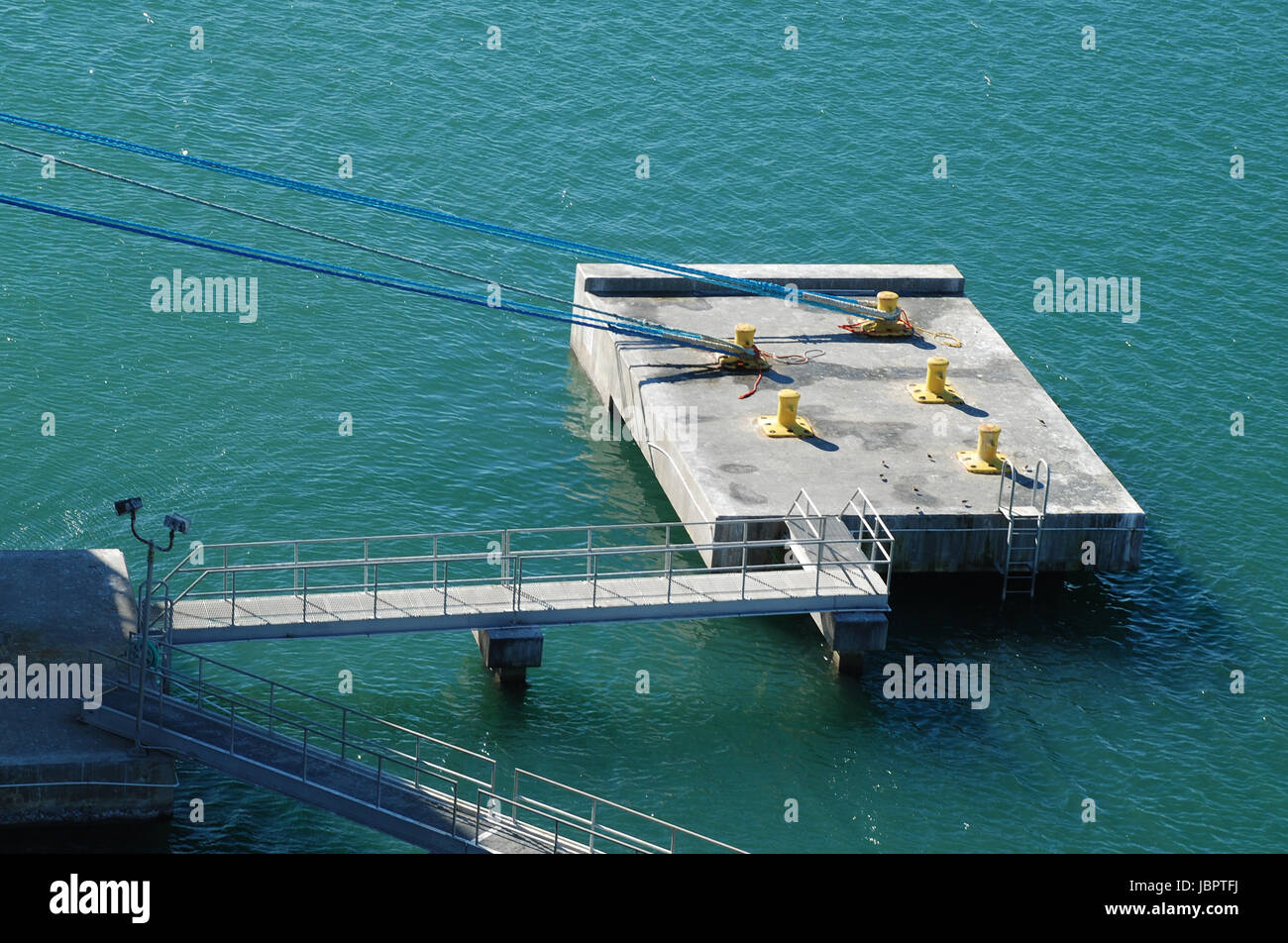 stock picture of ship ropes and structures to mooring the ship on the dock Stock Photo