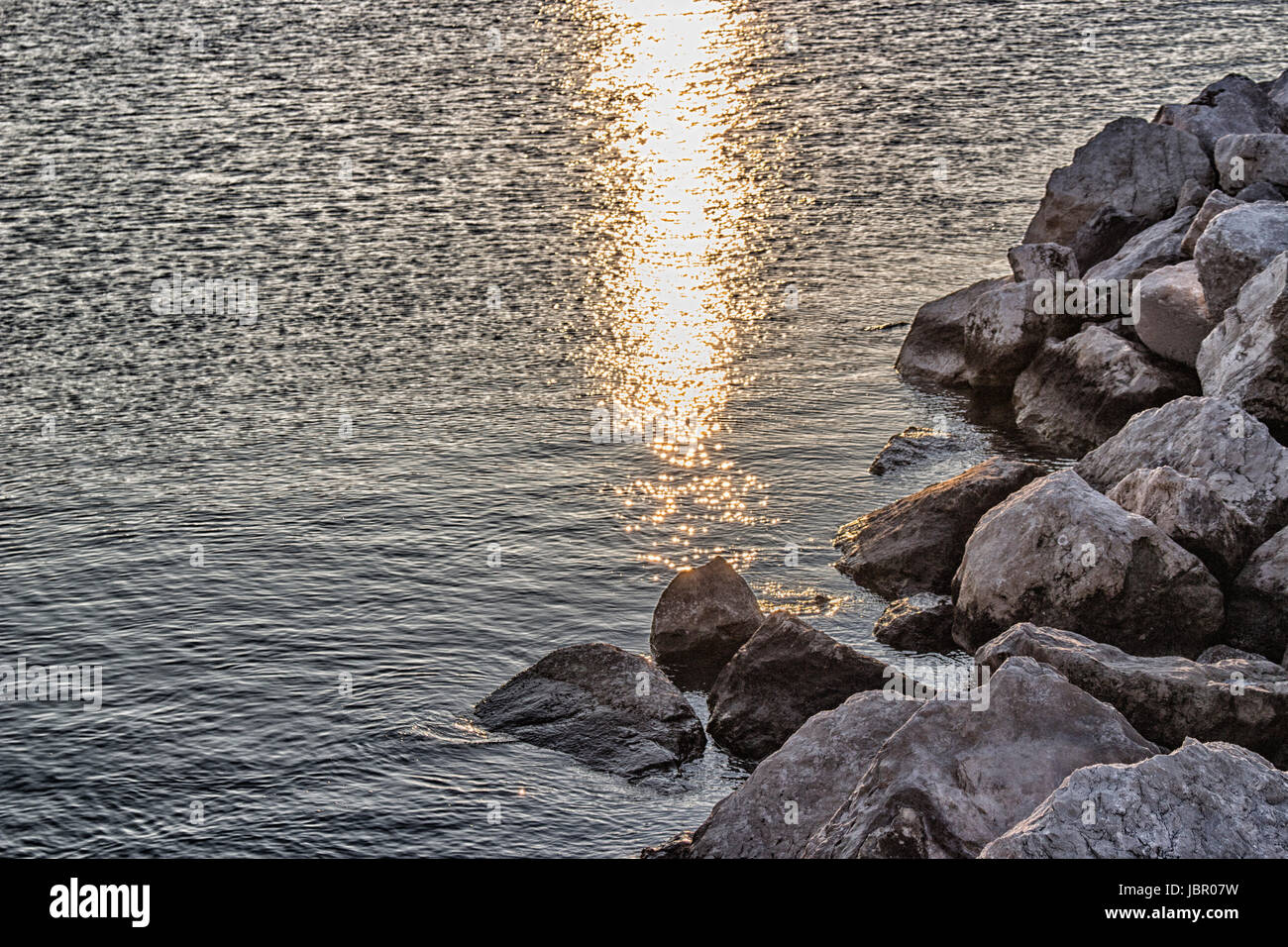 Northern Italy Rocks Rocks in front of the harbour channel of Cervia in Northern Italy on ...