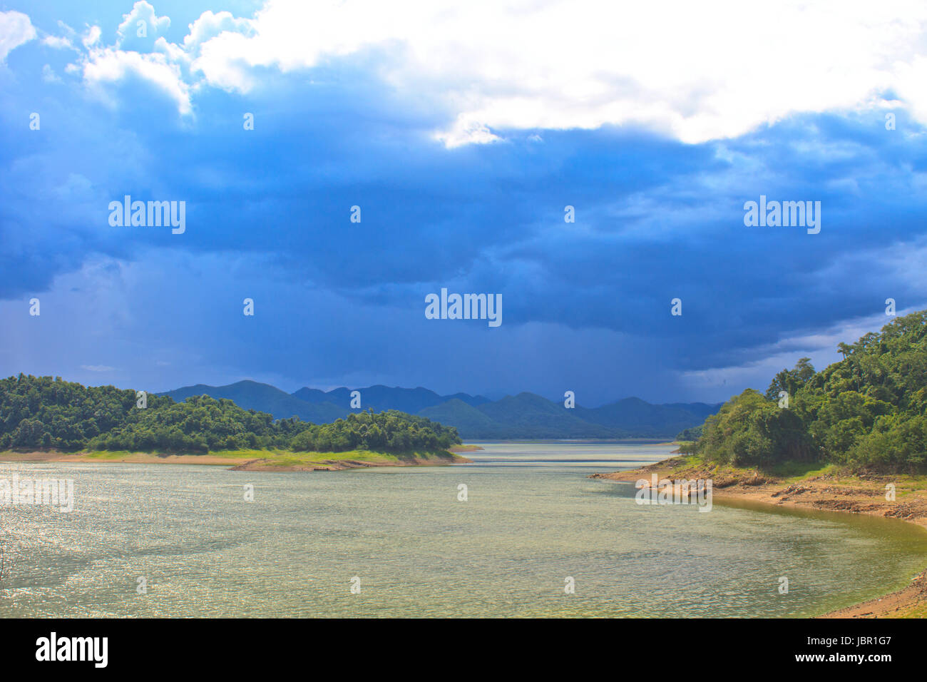dark storm clouds before rain at over lake Stock Photo - Alamy