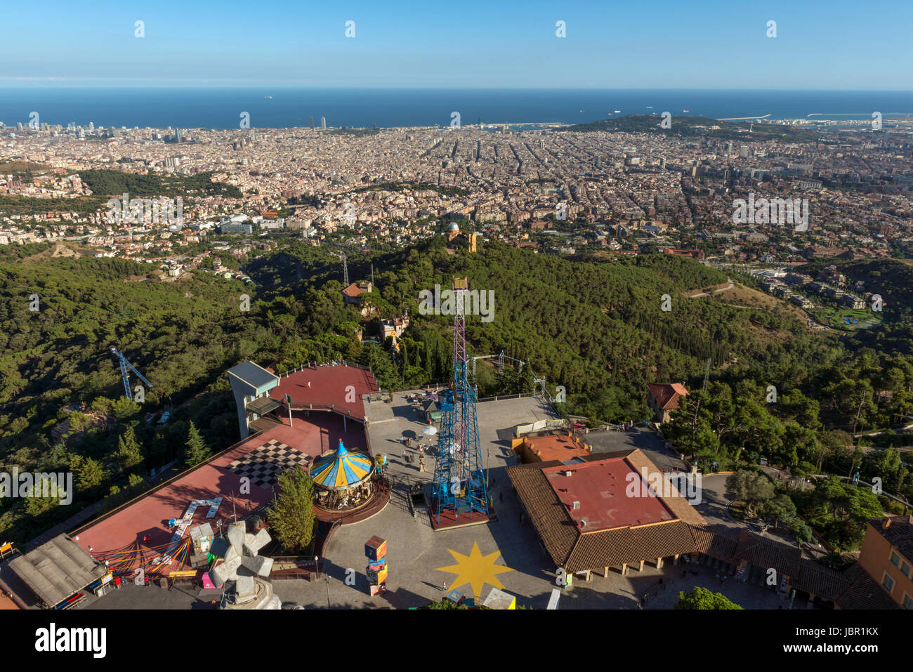 Cityscape of Barcelona seen from Tibidabo, Spain's longest running amusement park and Europe's third-oldest. Stock Photo