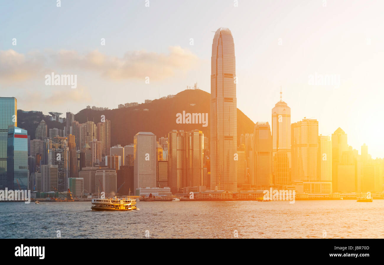 Hong Kong sunset with office buildings Stock Photo - Alamy