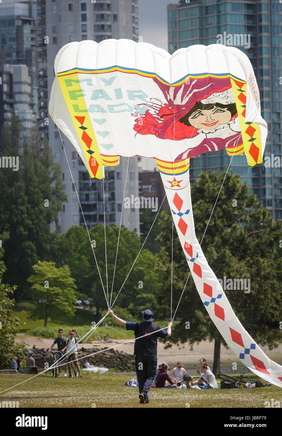 Vancouver, Canada. 11th June, 2017. A kite flyer controls a giant kite