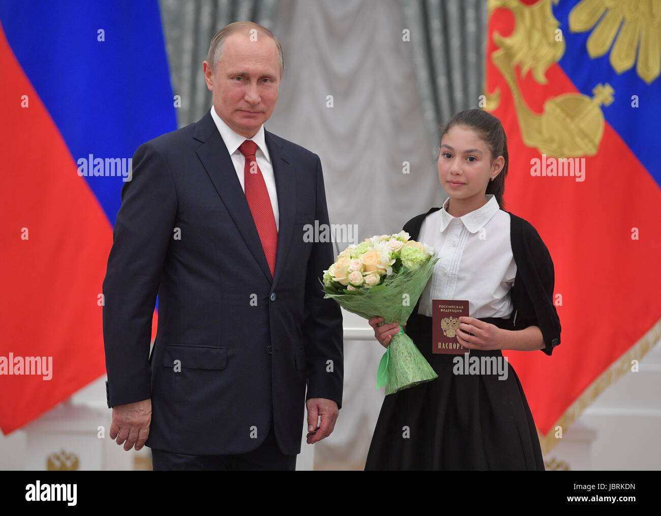 Vladimir Putin presented a Russian passport to Steven Sigalu 25.11.2016 57 Vladimir Putin presented a Russian passport to Steven Sigalu 25.11.2016 40