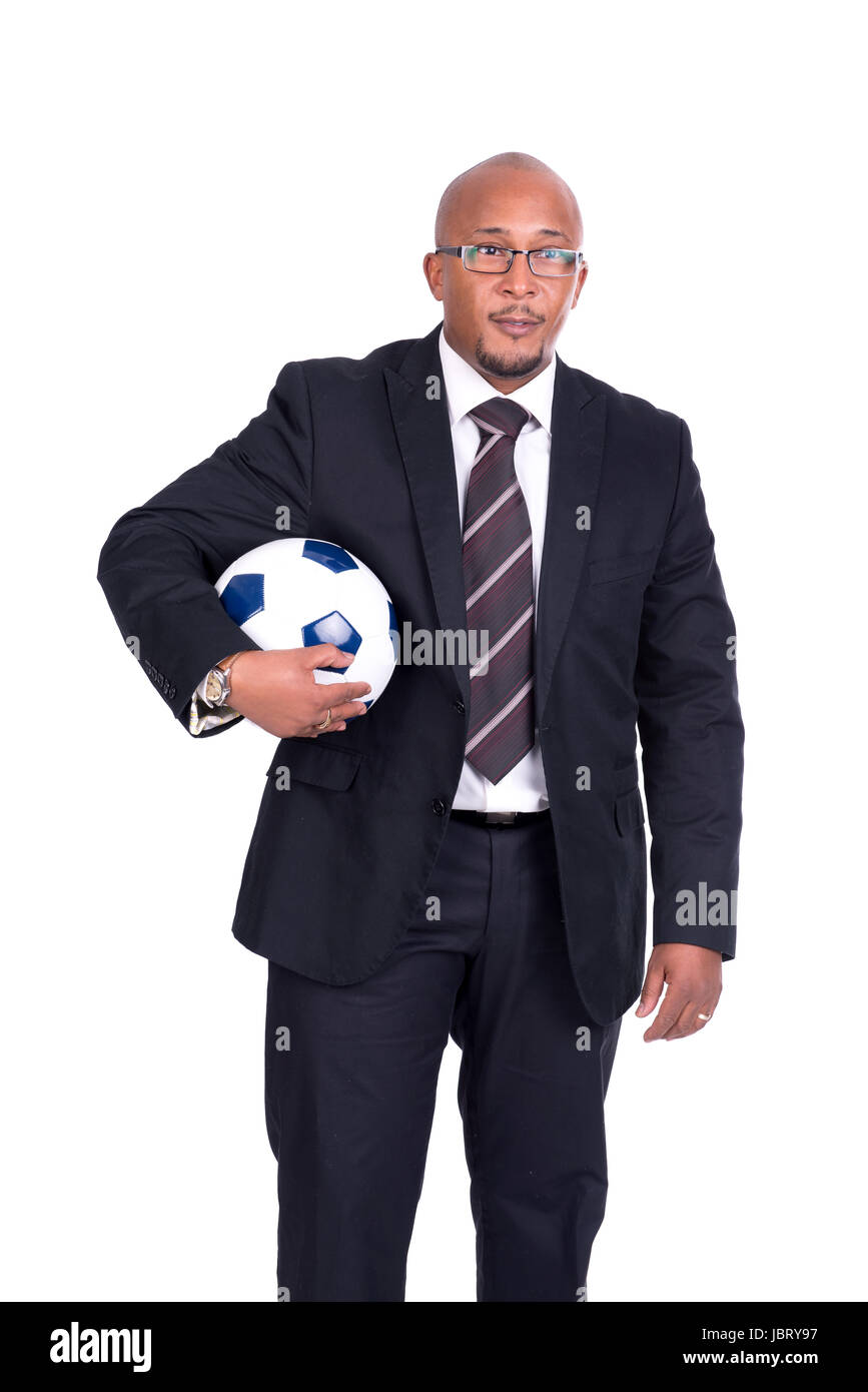 Businessman with soccer ball isolated in white Stock Photo - Alamy