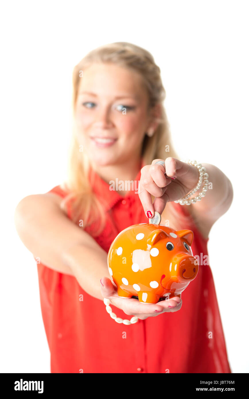 blonde woman with piggy bank Stock Photo - Alamy