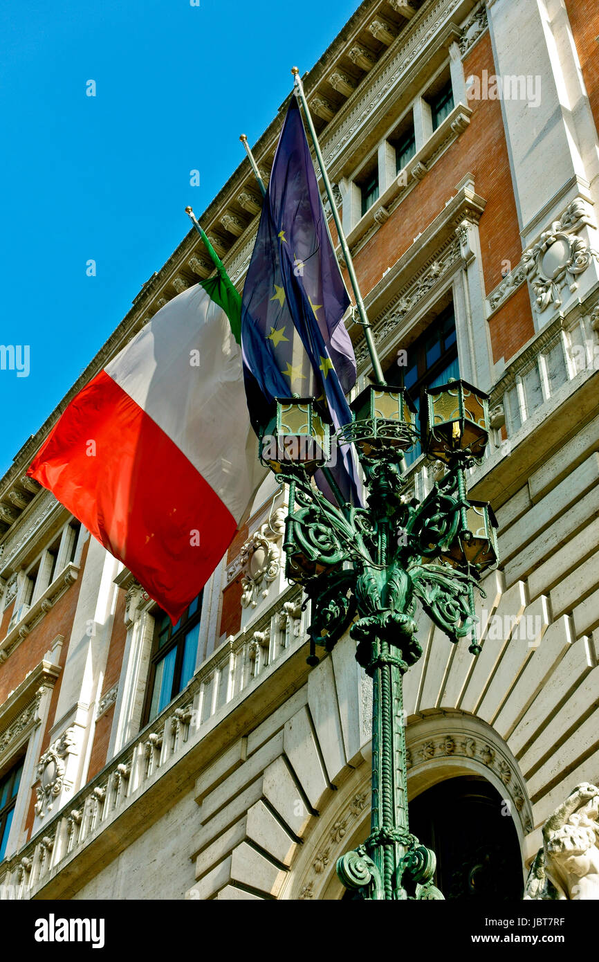 Palazzo Montecitorio. Chamber of Deputies of the Italian Republic. Italian Parliament. Camera dei deputati. Flying European, talian flag. Rome, Italy Stock Photo