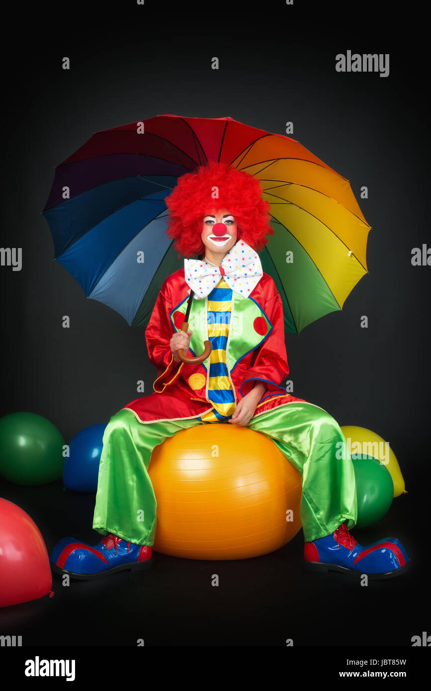 waiting clown on ball seat Stock Photo