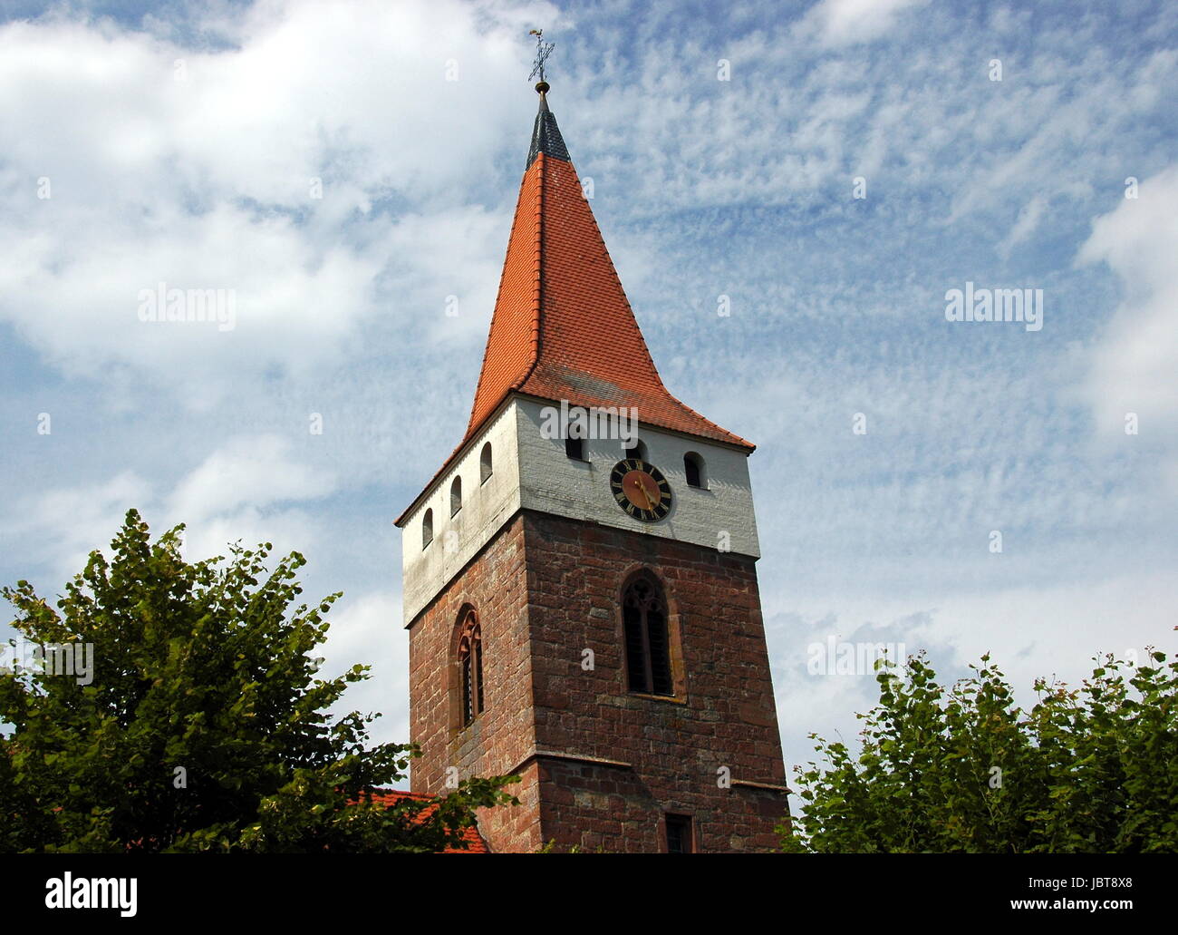 tower of the historic church in minfeld / pfalz Stock Photo