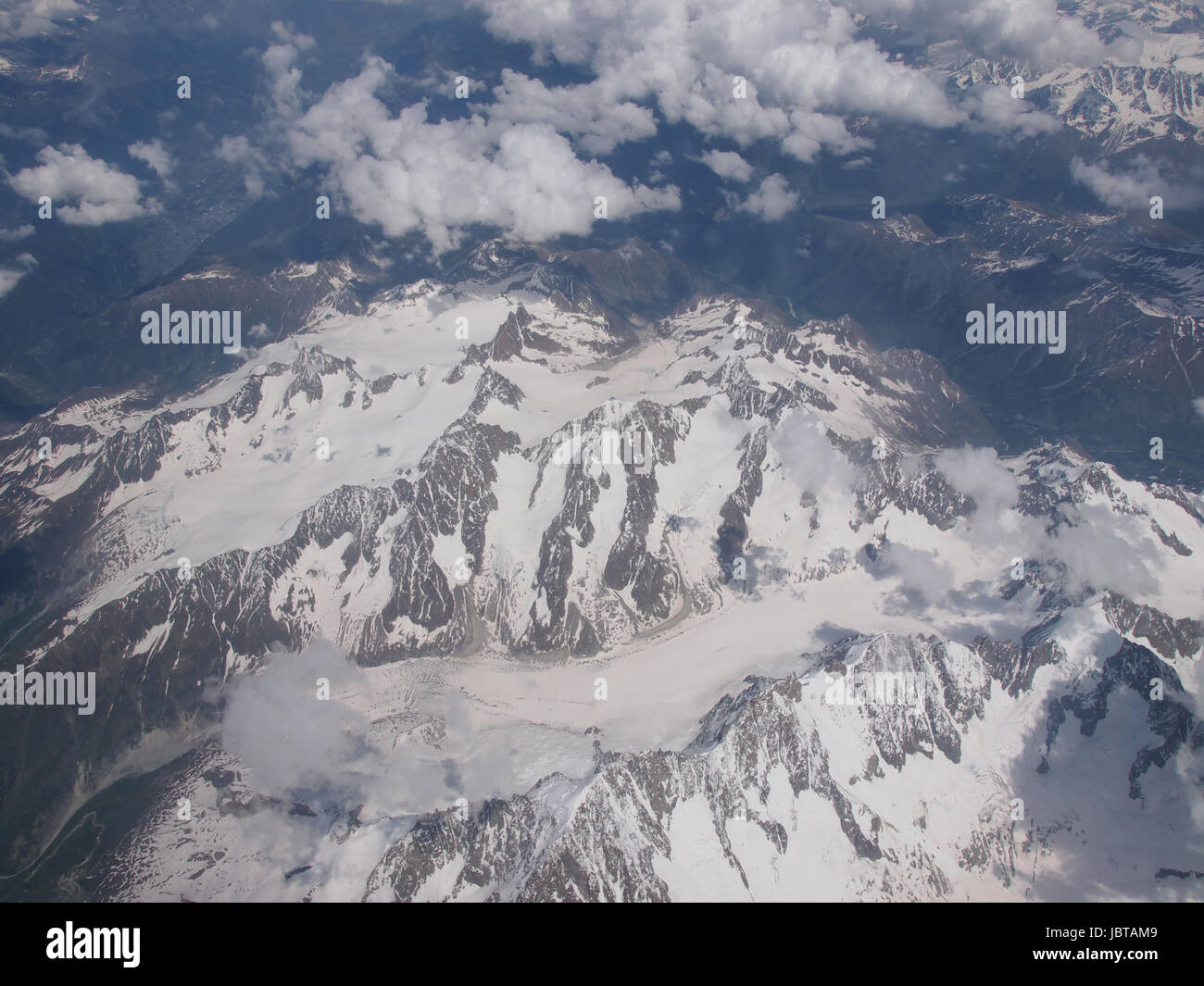 Aerial view of a glacier in Alps mountains Stock Photo - Alamy