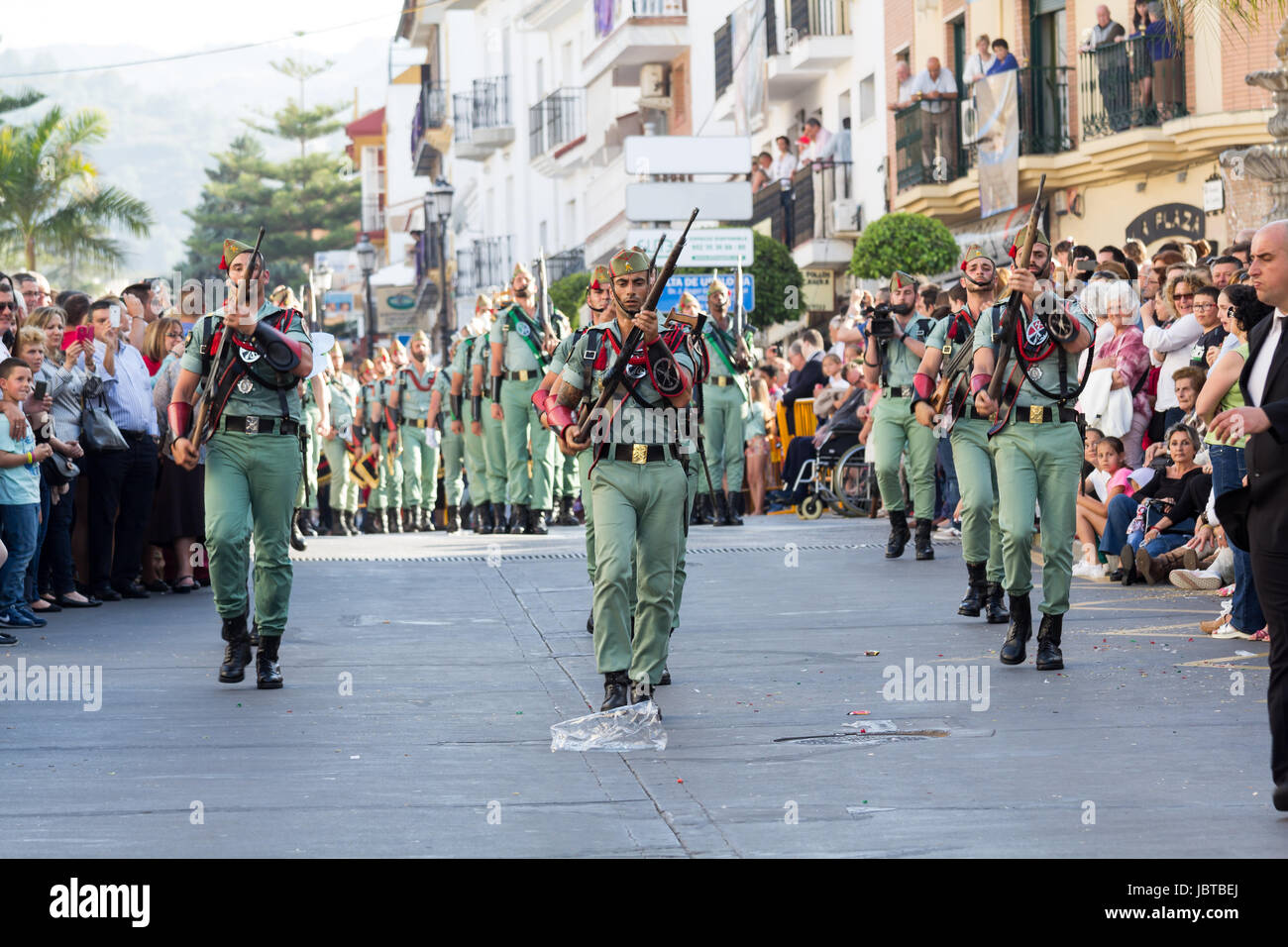 MALAGA, SPAIN - APRIL 18: Unidentified spanish legionnaires marching during an Easter parade on April 18, 2014 in Alhaurin de la Torre, Malaga, Spain. Stock Photo