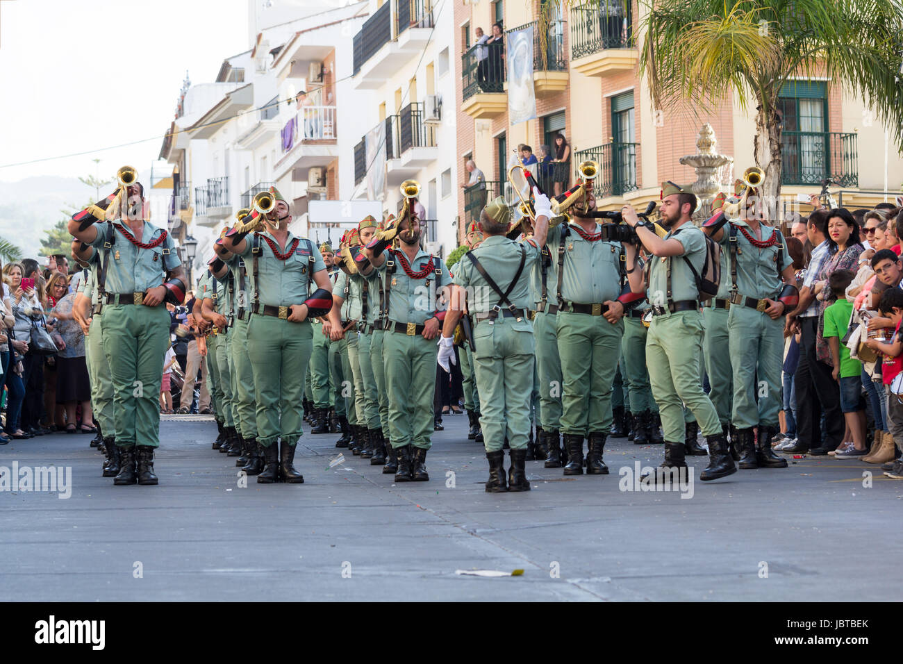 MALAGA, SPAIN - APRIL 18: Unidentified spanish legionnaires marching during an Easter parade on April 18, 2014 in Alhaurin de la Torre, Malaga, Spain. Stock Photo