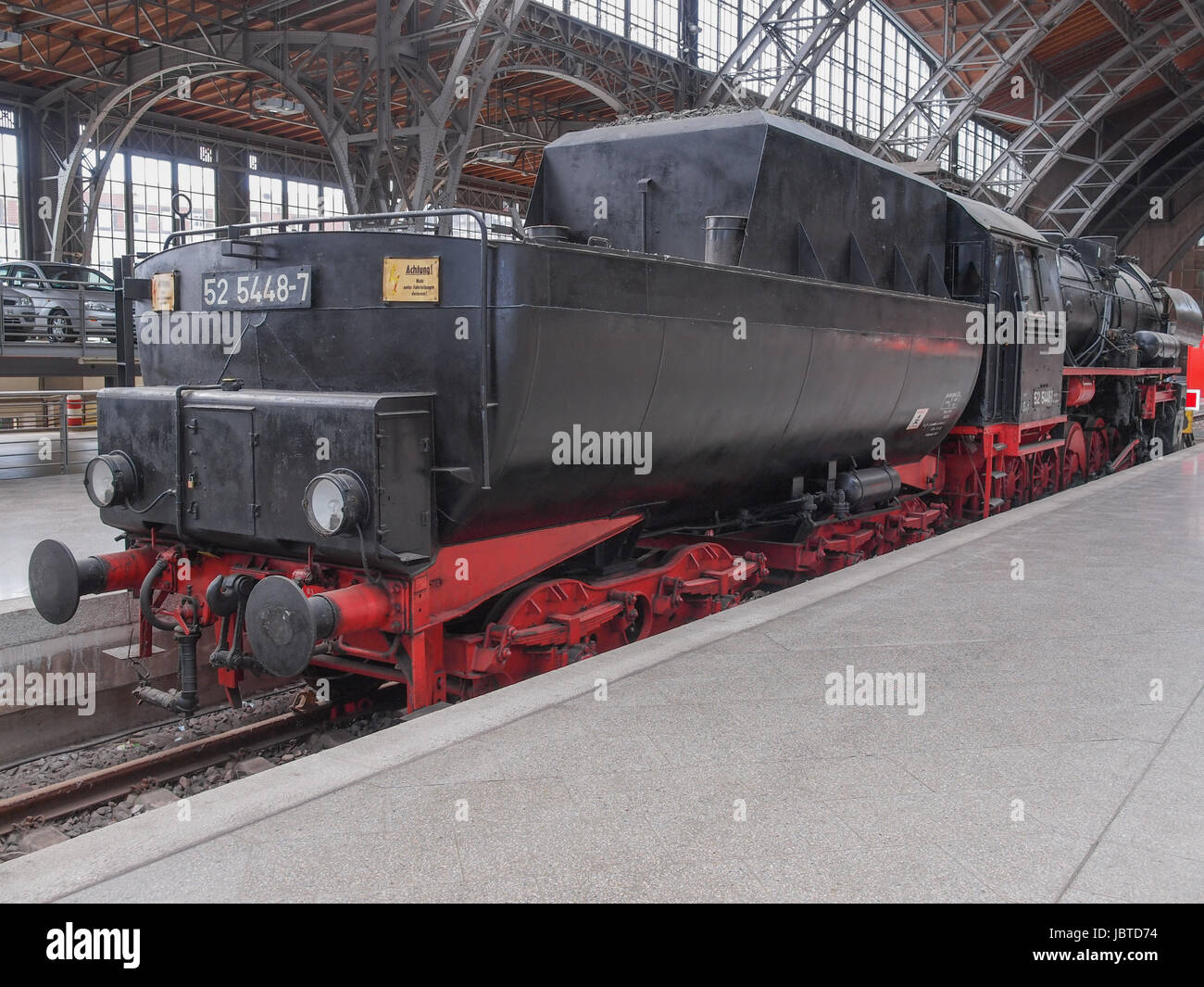 LEIPZIG, GERMANY - JUNE 12, 2014: Class 52 steam locomotive 52 5448 7 of the Deutsche Reichsbahn at Leipzig Hbf station Stock Photo