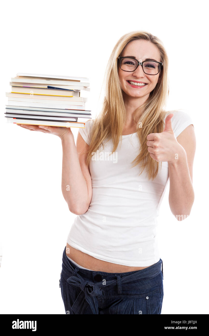 Junge blonde Frau mit langen blonden Haaren mit einem Stapel Bücher auf dem Arm isoliert vor weißem Hintergrund Stock Photo