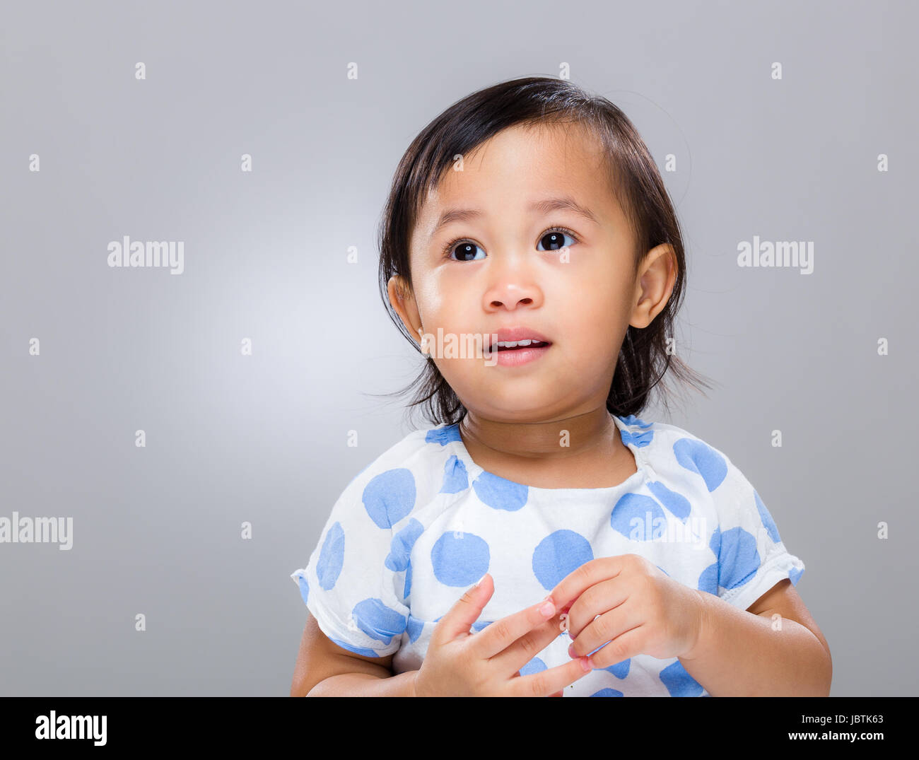 Confuse baby girl Stock Photo - Alamy