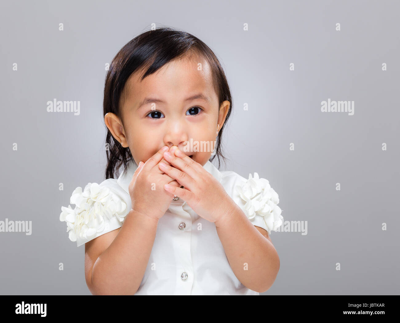 Multiracial baby keep quiet Stock Photo Alamy