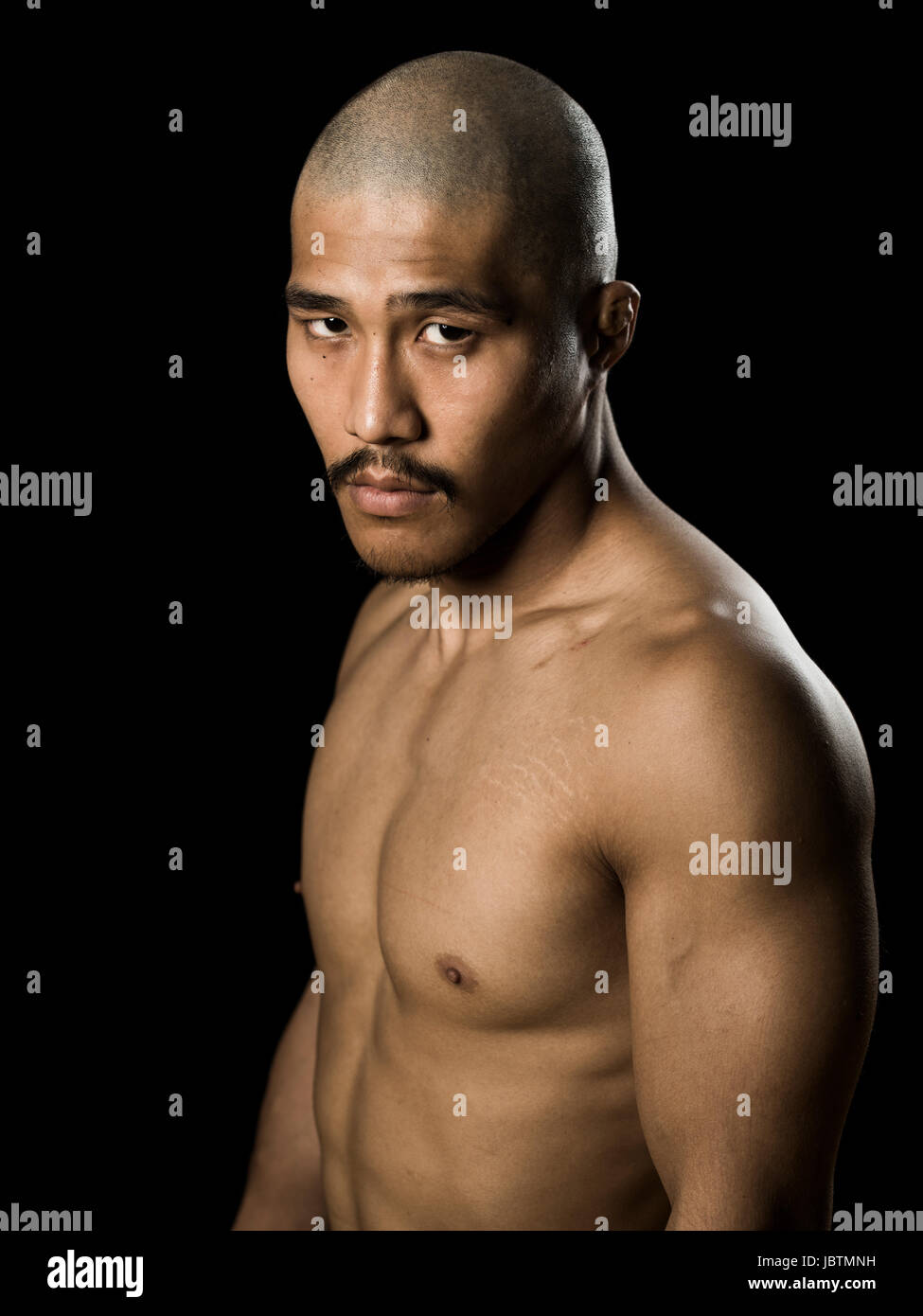 Portrait of MMA fighter Erson Yamamoto at Krazy Bee Gym, Itoman City, Okinawa, Japan Stock Photo