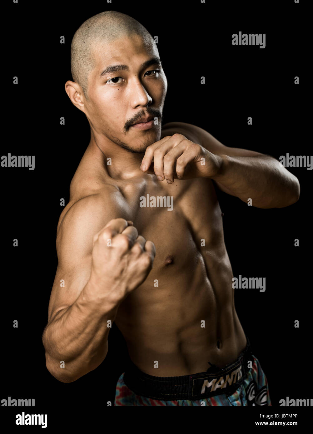 Portrait of MMA fighter Erson Yamamoto at Krazy Bee Gym, Itoman City, Okinawa, Japan Stock Photo