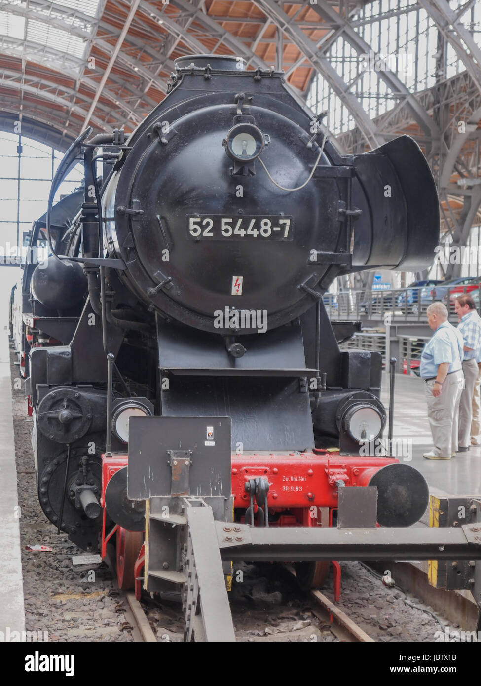 LEIPZIG, GERMANY - JUNE 12, 2014: Class 52 steam locomotive 52 5448 7 of the Deutsche Reichsbahn at Leipzig Hbf station Stock Photo
