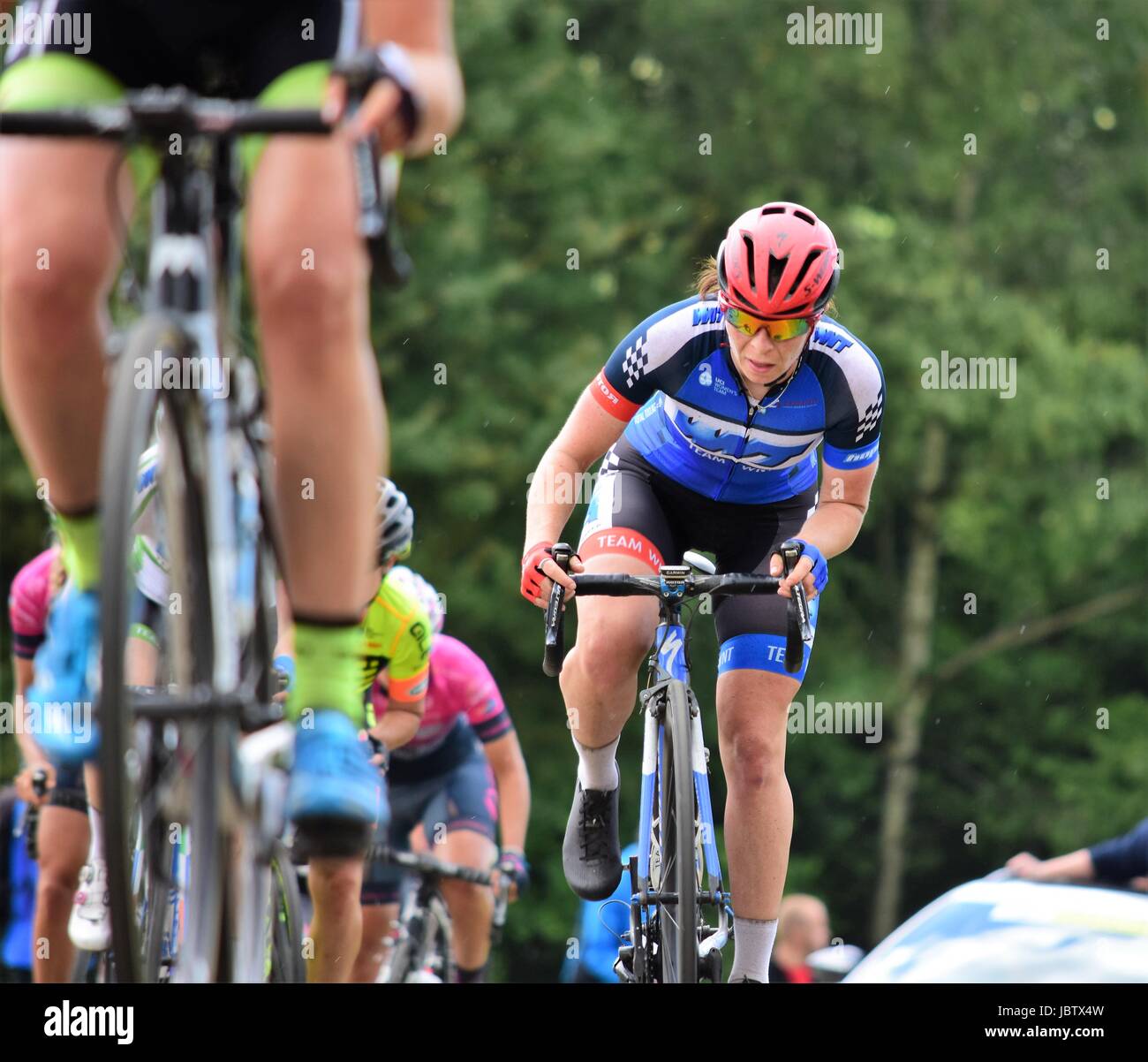 Cyclists racing in the Queen of the Mountain segment of Stage 3 of the 2017 OVO Energy Women's Tour Stock Photo